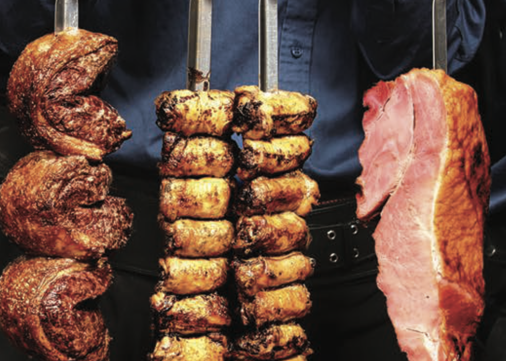 meats on skewers at a steakhouse
